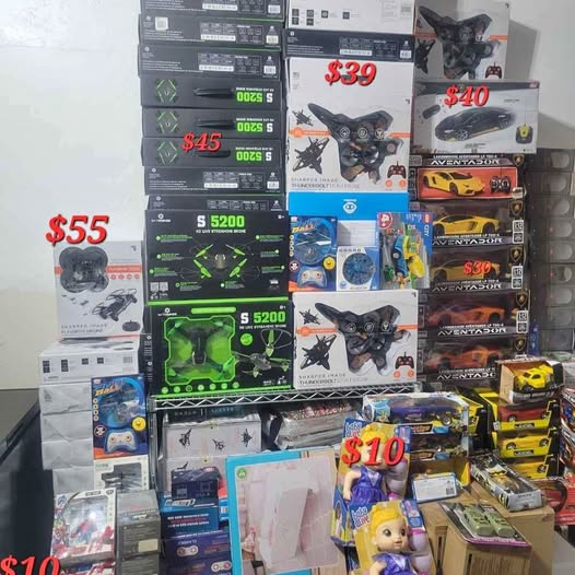 Assorted RC drone and car toy set in retail boxes