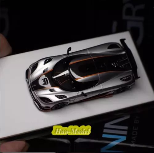 1:64 Koenigsegg Agera RS diecast car model, silver with black and orange accents