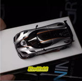 1:64 Koenigsegg Agera RS diecast car model, silver with black and orange accents
