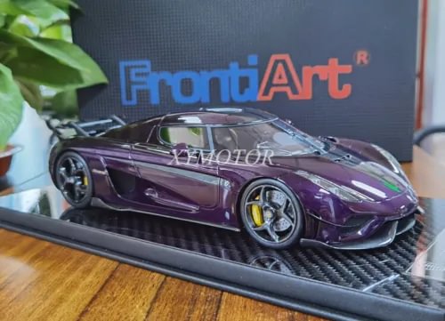 Purple resin diecast model car on black display base, detailed wheels and headlights