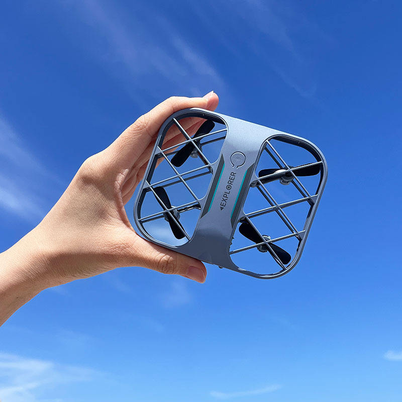 Mini quadcopter drone with 4K camera, light blue body and foldable prop guards.