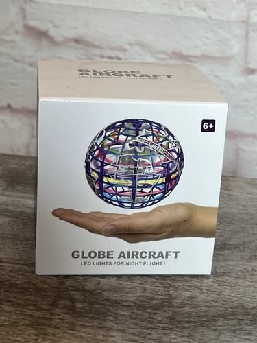 Globe aircraft mini drone with LED lights, shown in retail box