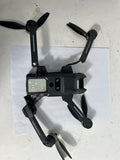 Black quadcopter drone with 4 propellers and front camera module