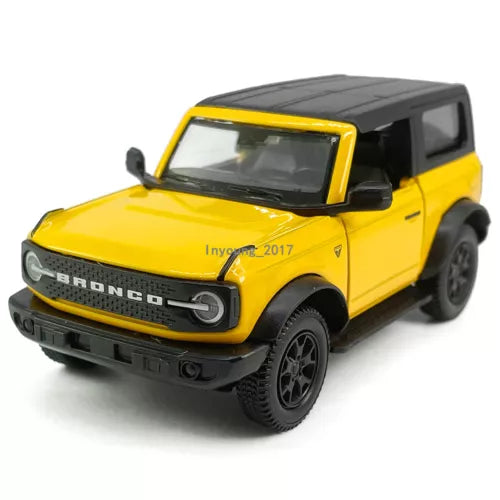 Yellow 1:36 diecast Ford Bronco SUV toy car with black hood, front 3/4 view