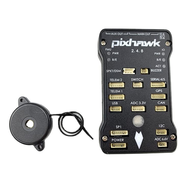 Pixhawk flight control board with GPS module, antenna puck, and connecting cable