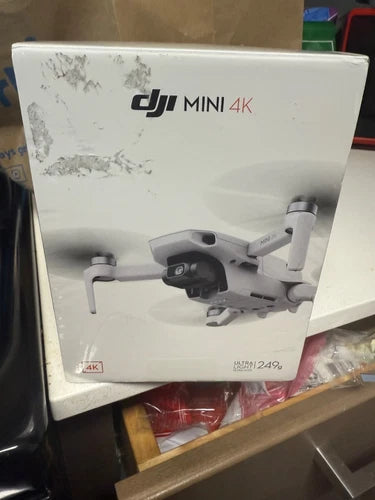 DJI drone retail box with pictured quadcopter and camera drone design