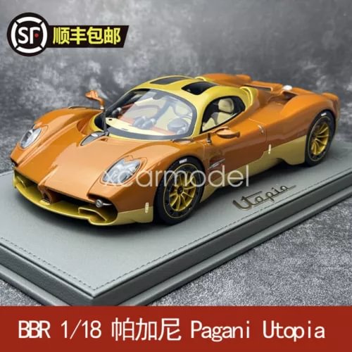 Diecast model car with copper-orange body, yellow accents, and sleek sports design