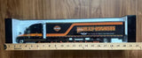 Die-cast Harley-Davidson semi truck with van trailer in retail box, orange and black