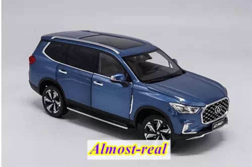 Blue diecast SUV model car with detailed grille and headlights, front 3/4 view