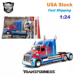 Blue and red diecast semi truck model with robot figure, 1:24 scale