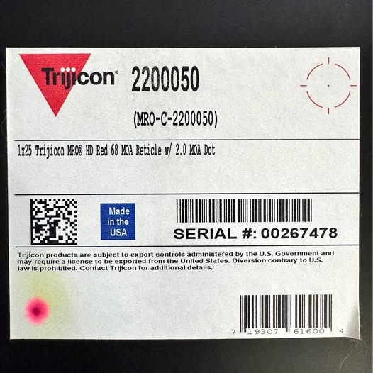 Trijicon MRO HD hunting scope serial label with barcode and red Trijicon logo