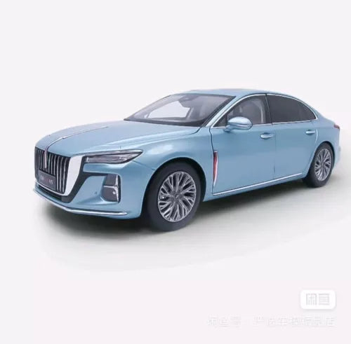 Blue 1:18 diecast sedan model with chrome grille, front 3/4 view