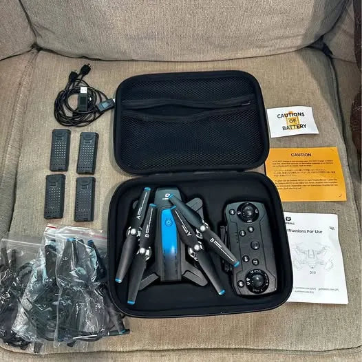 DEERC drone kit with blue quadcopter, controller, and carry case