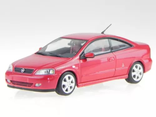 Red coupe diecast model car with front grille and silver wheels, 1:43 scale