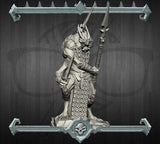 Tabletop game miniature: armored humanoid figure holding tall polearm on round base