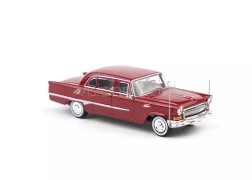 Red 1:64 scale diecast sedan model with detailed chrome grille and wheels