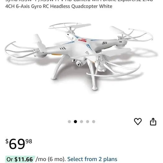 White 4-rotor quadcopter drone with four propellers and landing legs