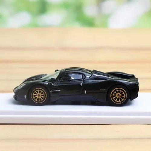 1/64 scale black diecast sports coupe model with gold wheels and openable doors