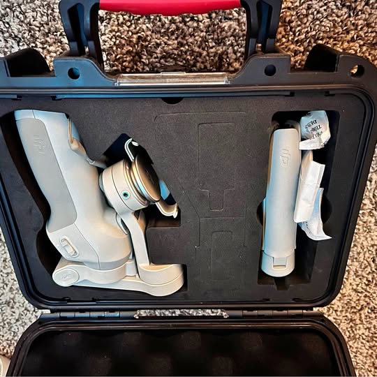 DJI drone in Symik hard case, folded arms and body visible