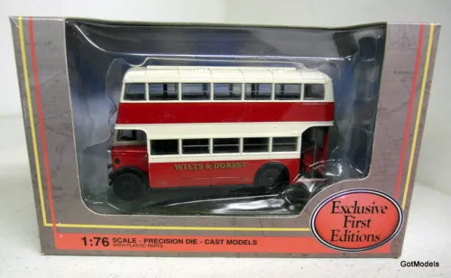 Red and cream diecast utility bus model with Wilts & Dorset markings, in box