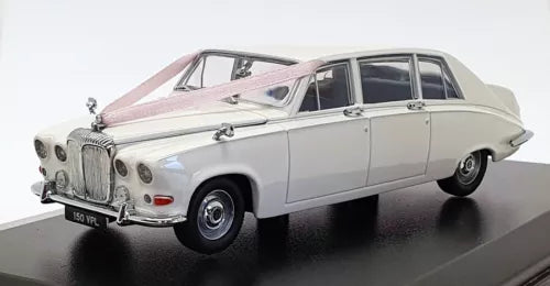 White diecast wedding car model with chrome grille, headlights, and side mirrors