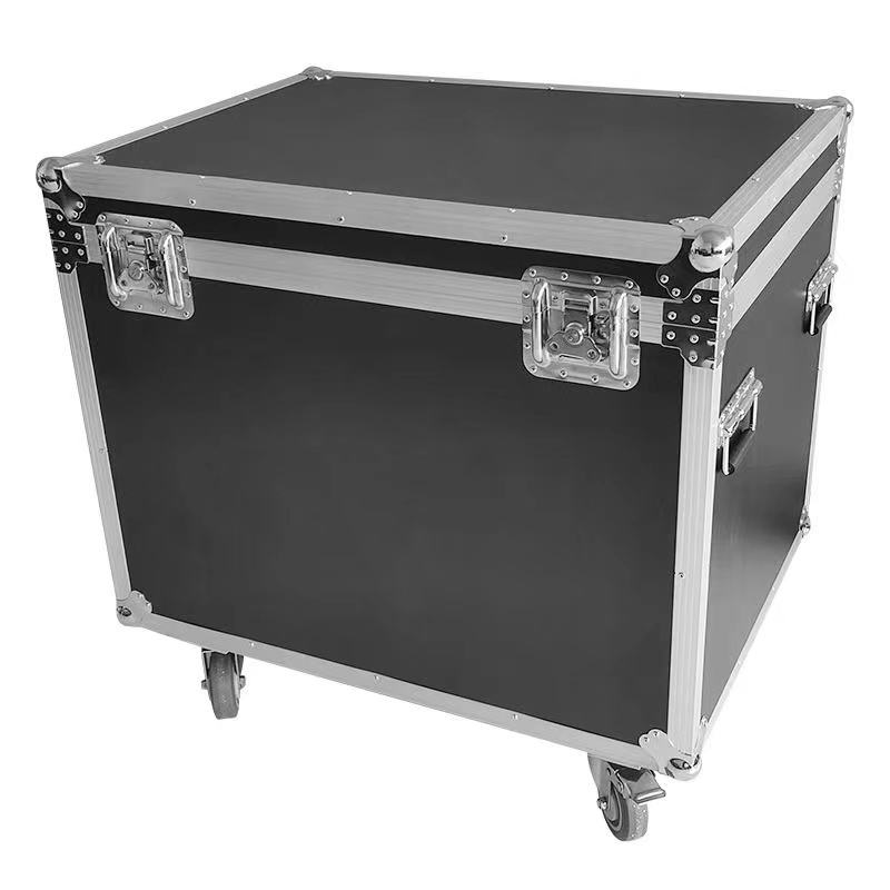 Hard-sided flight case with black interior, metal corners and latches, rolling wheels