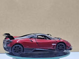 Red diecast sports car model toy with black wheels and black rear spoiler