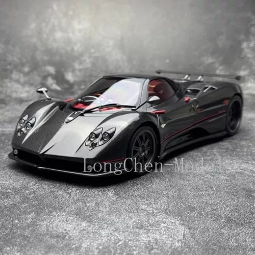Diecast sports car model in black and silver with front hood vents and headlights