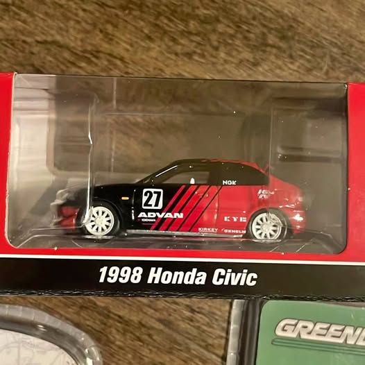 1998 Honda Civic JDM diecast car, red/black with racing decals, in clear box