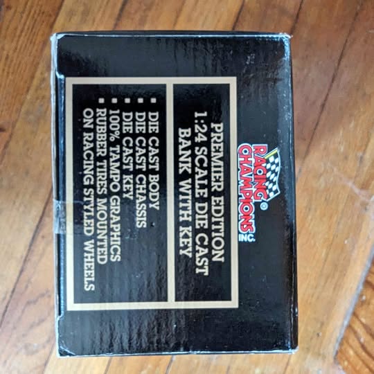 Diecast bank box side with Racing Champions Wichita KS text and Hot Wheels logo
