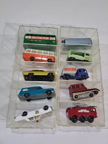 Vintage diecast matchbox vehicles set in clear display case with multiple cars