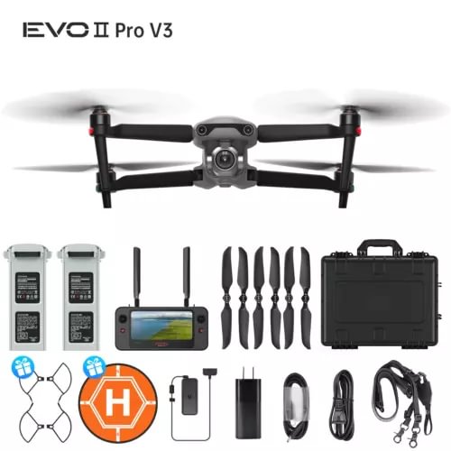 Grey camera drone with foldable arms and controller, plus propellers and case