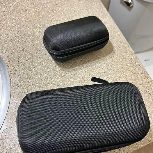 Black textured hard-shell drone carrying case with zipper