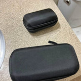 Black textured hard-shell drone carrying case with zipper