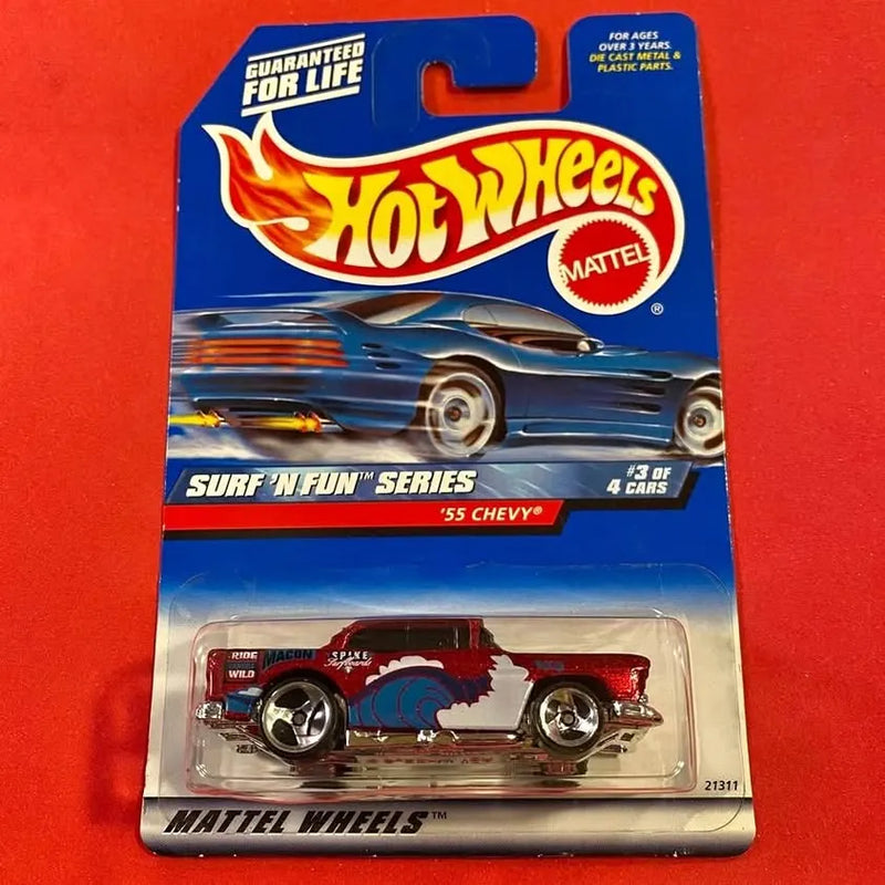 Hot Wheels 55 Chevy diecast car in blister package, blue and red flames