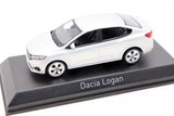 White diecast sedan toy car model on display base, side view