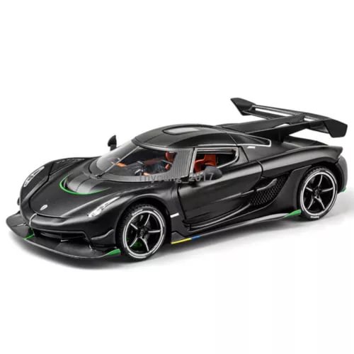 Black 1:24 diecast model car with green wheel accents and detailed aero body