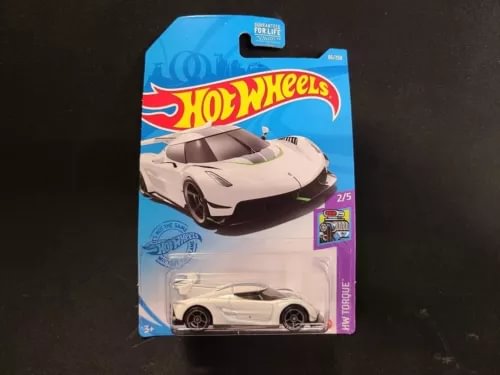 Hot Wheels diecast sports car model, white, in blister package, front view
