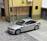Silver diecast sports coupe model car toy with detailed front and side.