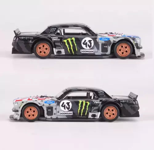 Diecast racing coupe toy car, black and white with Monster Hoonigan decals