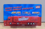 Red MULLER diecast truck toy on blister card, front cab and wheels visible