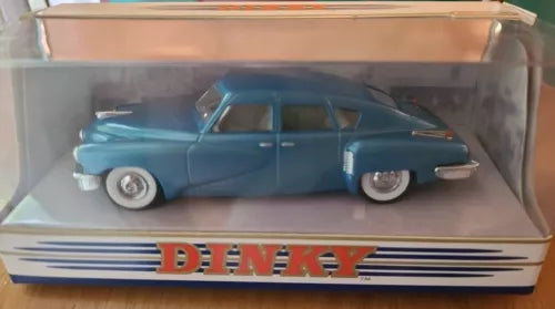 Blue diecast car in clear display box with DINKY logo