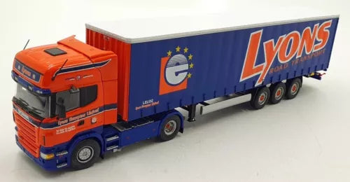 Diecast truck, orange cab and blue Lyons box trailer, front 3/4 view