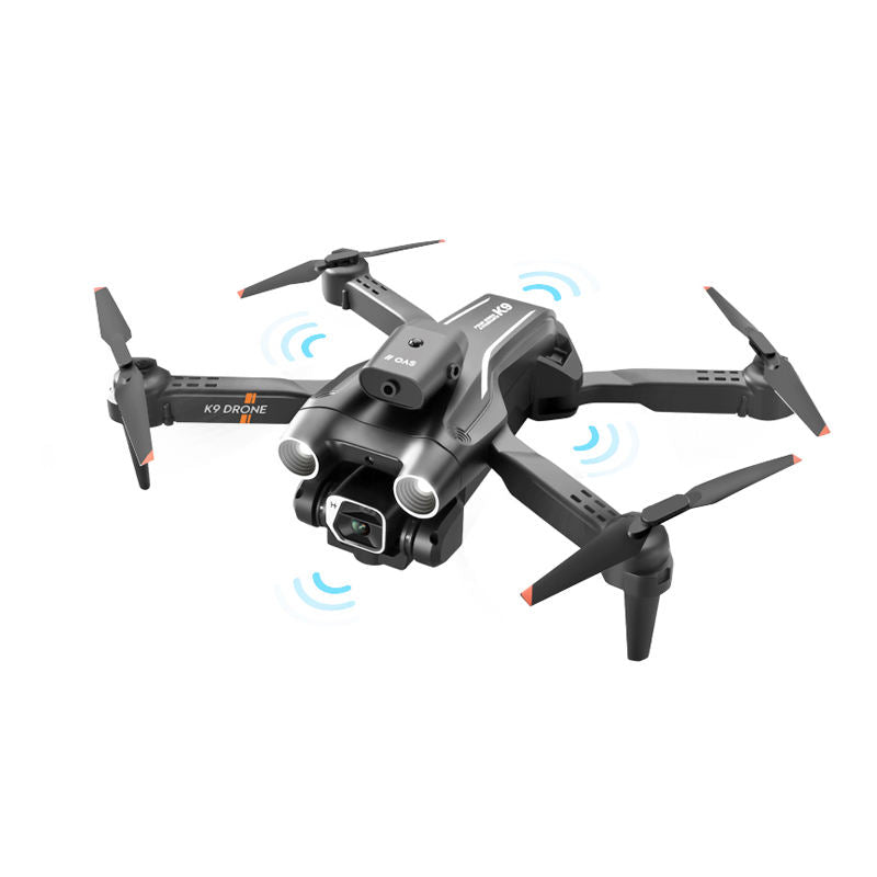 Mini quadcopter drone with camera, dark gray, foldable arms and propellers