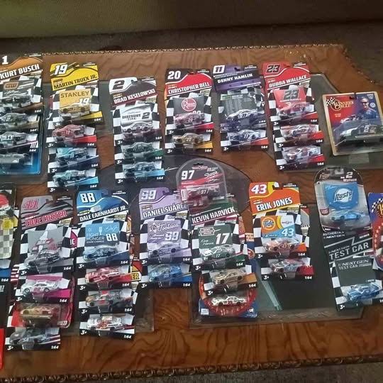 NASCAR diecast car lot, multiple boxed race cars in blister packs