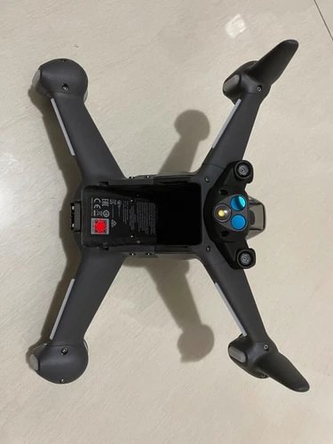 DJI FPV drone with four propeller arms and front control module, black