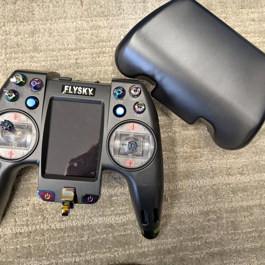 Black FPV controller with color screen and dual thumbsticks