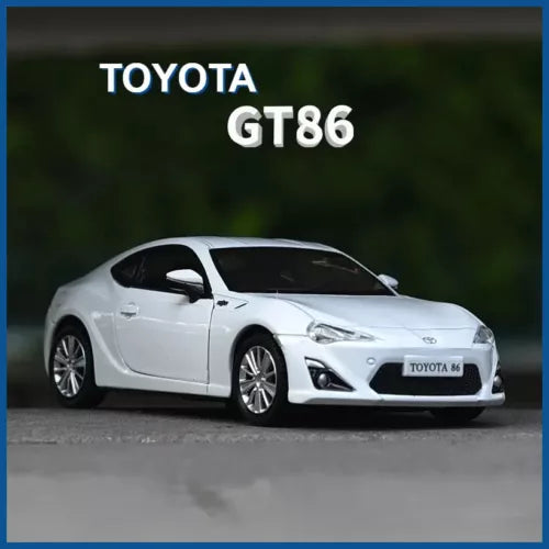 White alloy sports diecast car model, Toyota GT86 front three-quarter view
