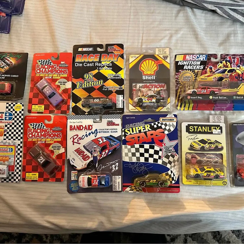 NASCAR diecast car replica assortment in retail boxes, multiple styles shown