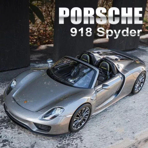 Porsche 918 Spyder diecast sports car model with open door, silver-gray